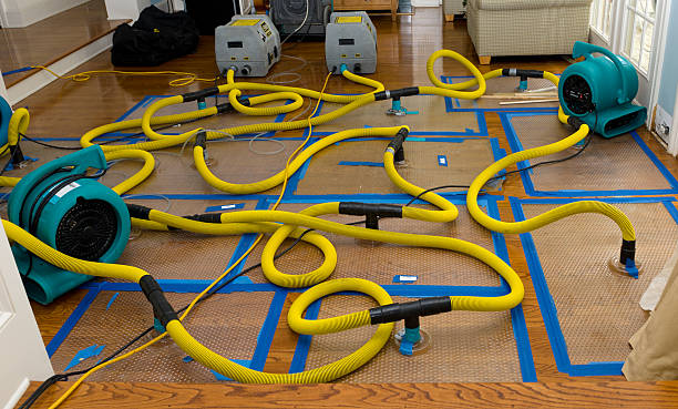 Professional Flood Damage Restoration technician working in Denver, NC